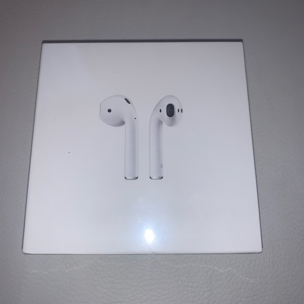 Unopened AirPods with Charging Case